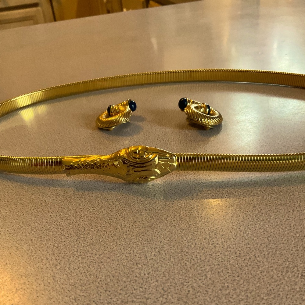 Belt snake style and clip on earrings set in pre owned condition.